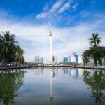 Ilustrasi headline berita nasional terkini menampilkan peta Indonesia dan ikon media
